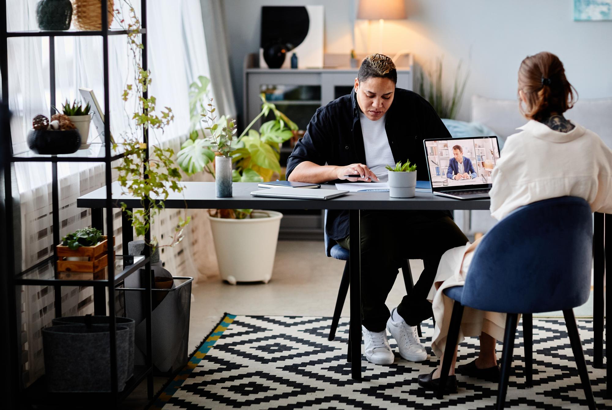 Consultant meeting with client in a studio